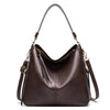 A dark brown vintage faux leather hobo shoulder bag with gold hardware shown from the front.