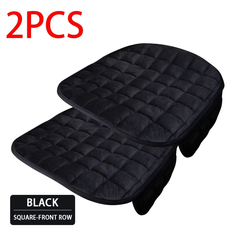 Two black quilted square-front row car seat covers.
