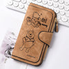 A brown leather zipper pouch featuring a bear illustration and the text OH my money FOREVER