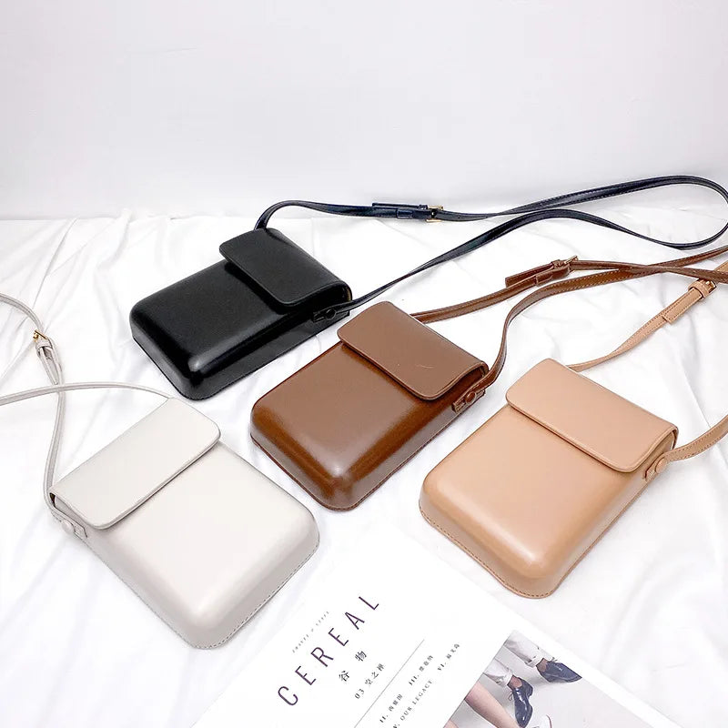 A collection of vintage PU leather crossbody bags in black, brown, and beige shades displayed on a white surface.