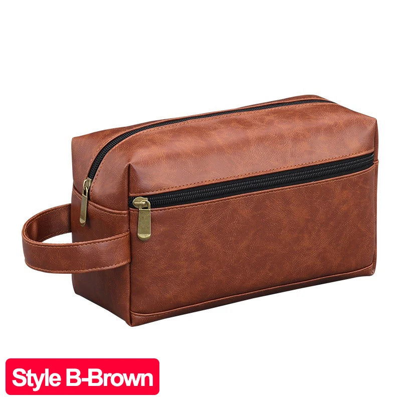 A brown PU leather travel toiletry bag with a zipper and leather strap.