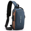 Marineblaues und braunes Designer-Anti-Diebstahl-Crossbody-Slingbag mit schwarzem Riemen.