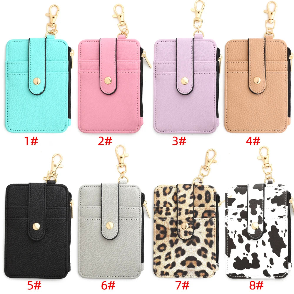 Eight color silicone PU leather key chain wristlet wallets displayed in a grid format.