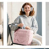 Three women are shown carrying or holding a quilted multi-compartment tote bag in various colors and styles.