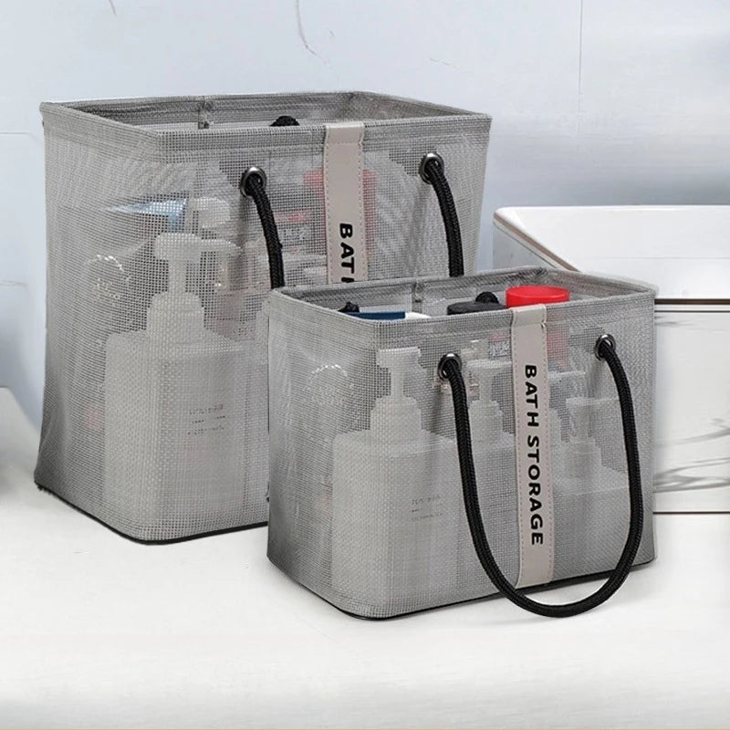 Gray mesh shower tote with handles used for storing toiletries or gym items.