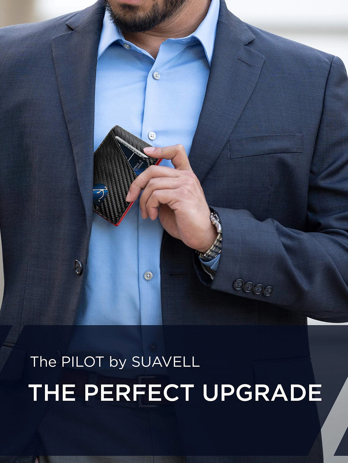 A man wearing a navy suit jacket and light blue shirt holds a black RFID blocking wallet.