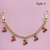 Gold decorative chain necklace with red and green bead pendants for bags and clothing