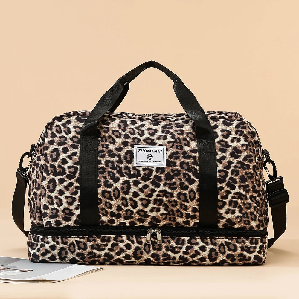 A brown and black leopard print travel duffel bag with a zippered compartment and black straps.