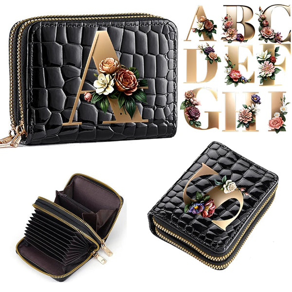 A black PU leather double-zip clutch wallet featuring gold lettering and floral accents.