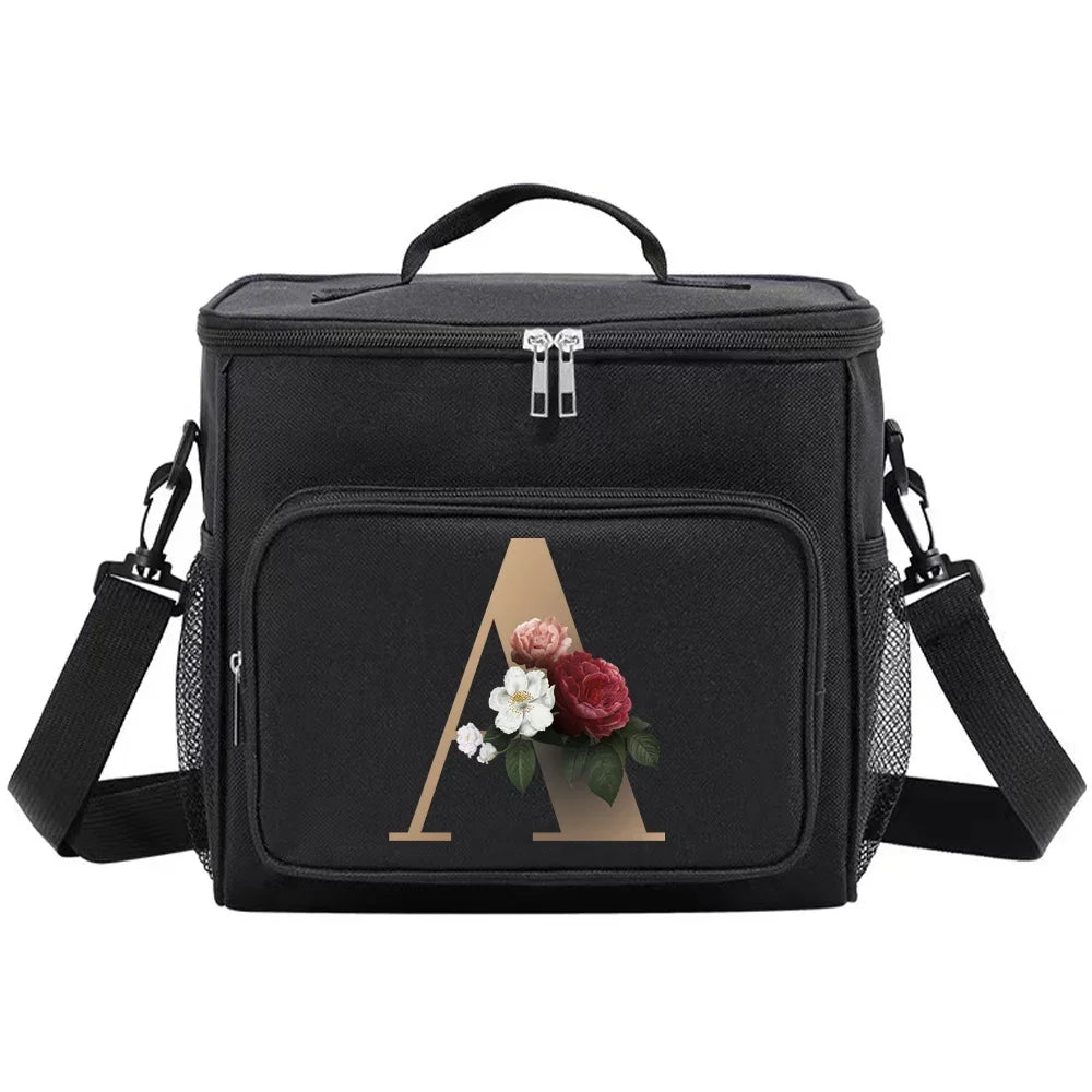 Black insulated canvas lunch bag with dual handles featuring a gold letter A and floral accents.