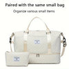 A cream-colored duffel bag paired with a matching small pouch for organizing various items.