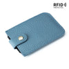 A teal genuine leather slim card holder with a stitched texture and a leather flap.