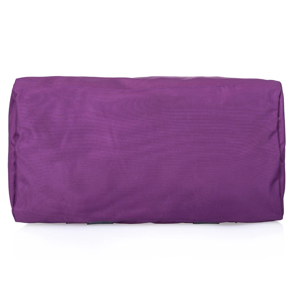 A purple water-resistant travel duffel bag with spacious storage.