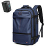 A navy blue heavy duty laptop backpack with vacuum compression features is shown next to its power adapter.