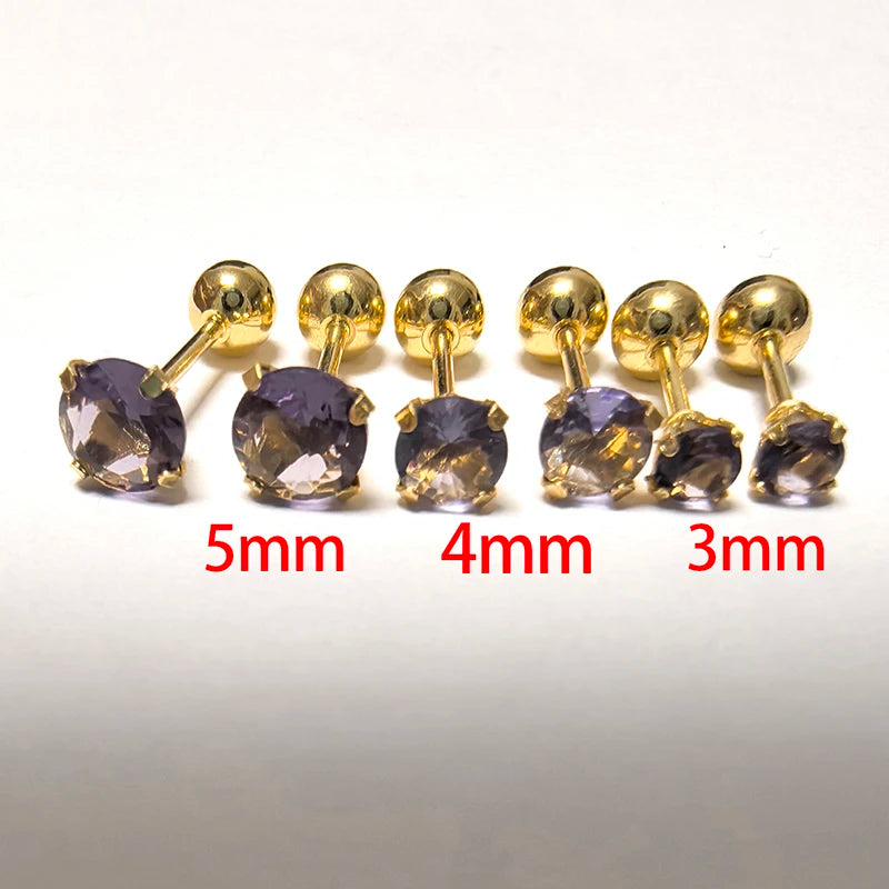 A set of gold-toned stainless steel ear stud earrings in various sizes, including 5mm, 4mm, and 3mm.