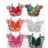 A collection of five decorative rhinestone butterfly appliqués or stickers in various colors like red, orange, pink, and gree