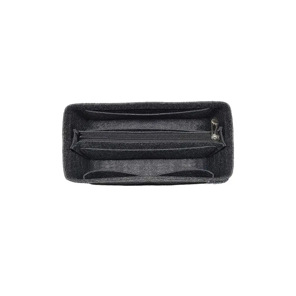A black felt bag organizer insert with a zippered compartment.