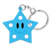 Charm en forme d'étoile silicone bleu clair attaché à une clé en argent.