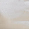A close-up view of a light beige soft PU leather shoulder tote bag.