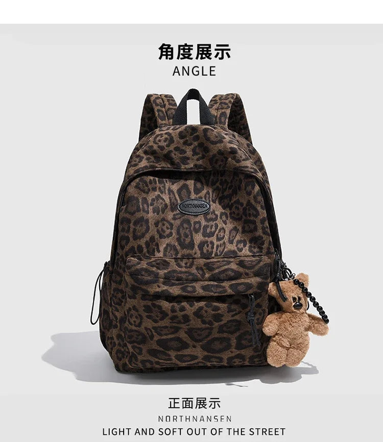 A brown leopard print backpack shown from the angle and front view.