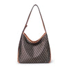 A brown geometric embroidery hobo shoulder bag with a long strap.
