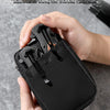 A hand holds a black EDC storage bag with multiple layers of mesh and fabric for organizing everyday carry items.