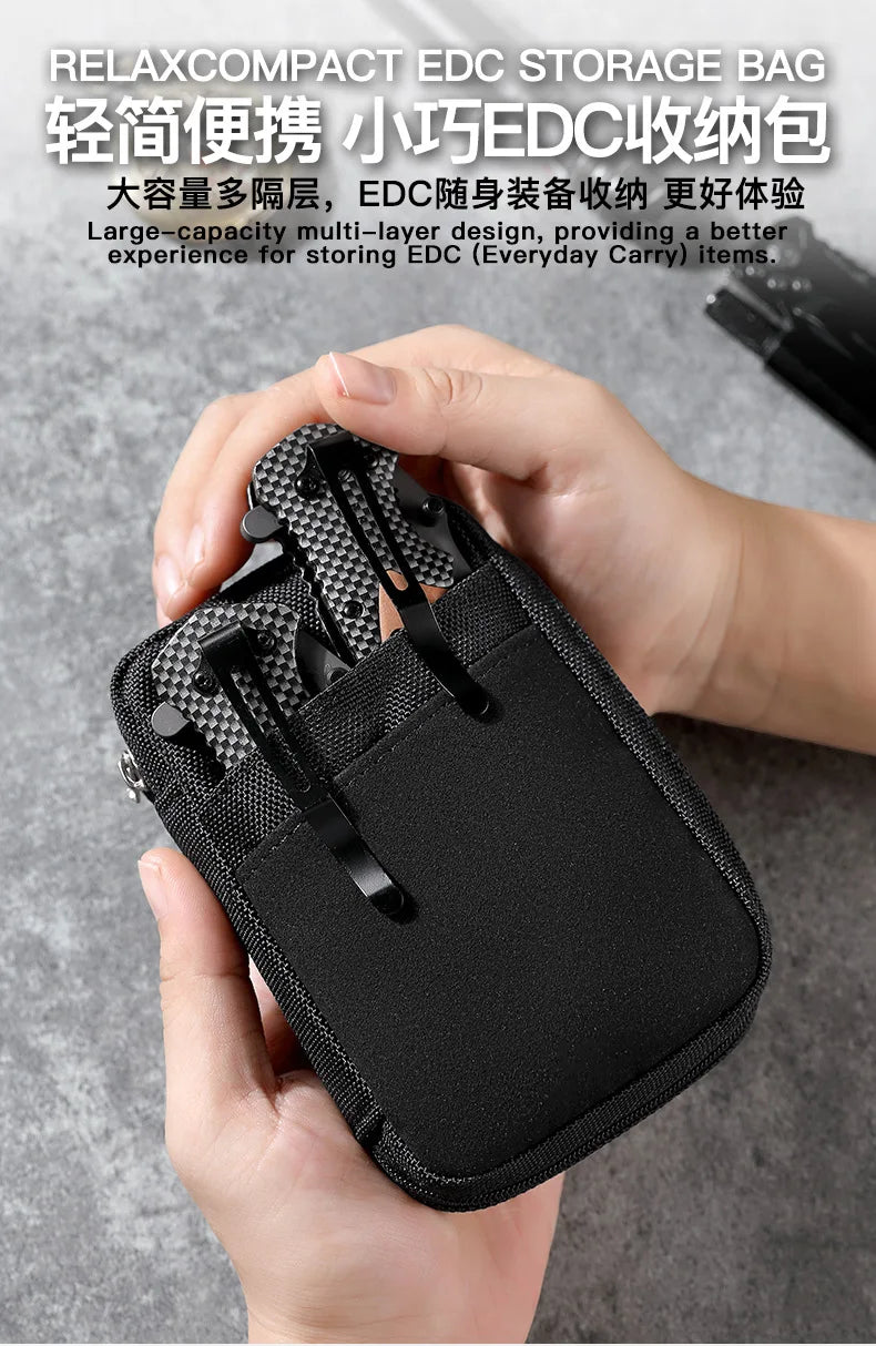 A hand holds a black EDC storage bag with multiple layers of mesh and fabric for organizing everyday carry items.