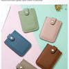 A collection of RFID slim card bags in various shades of green, pink, and brown leather.