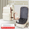 A cream-colored multi-functional vacuum bag travel backpack with an attached manual vacuum pump.