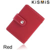A red slim leather card holder with a stitched edge and a metal closure is shown from above.