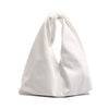A white minimalist crossbody tote bag folded and displayed against a white background.