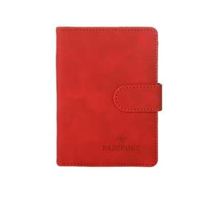 A red leather passport organizer with a flap closure and card slots.