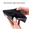 A hand holds a black leather business wallet with dual cash slots and a zipper closure.