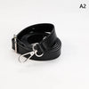 Black PU leather crossbody bag strap coiled and displayed against a white background.