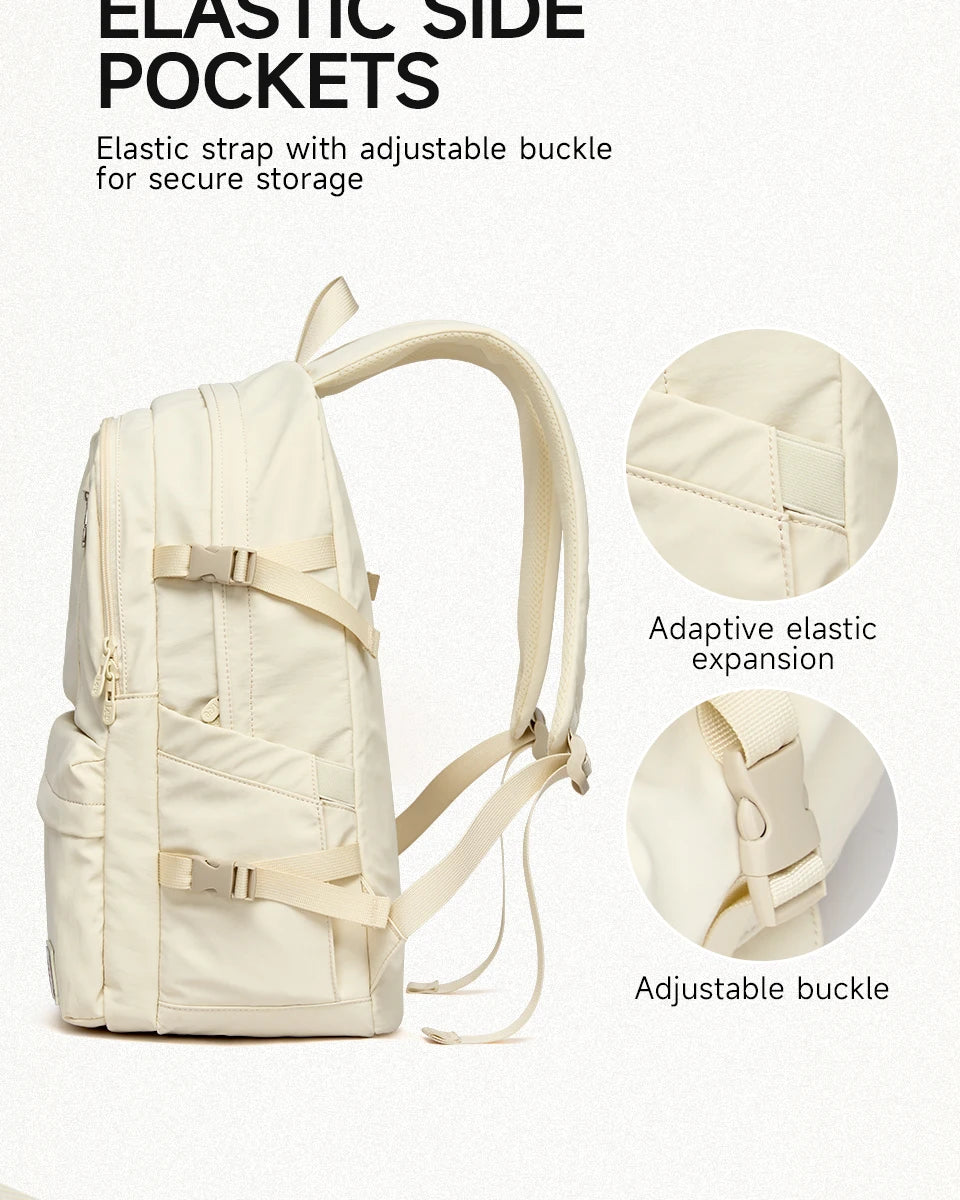 A cream-colored backpack featuring elastic side pockets and an adjustable buckle for secure storage.