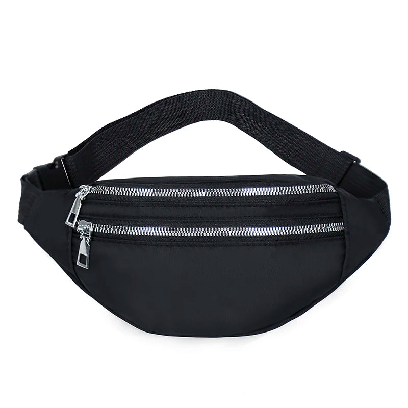 Black adjustable nylon crossbody sling bag with a silver zipper on a white background