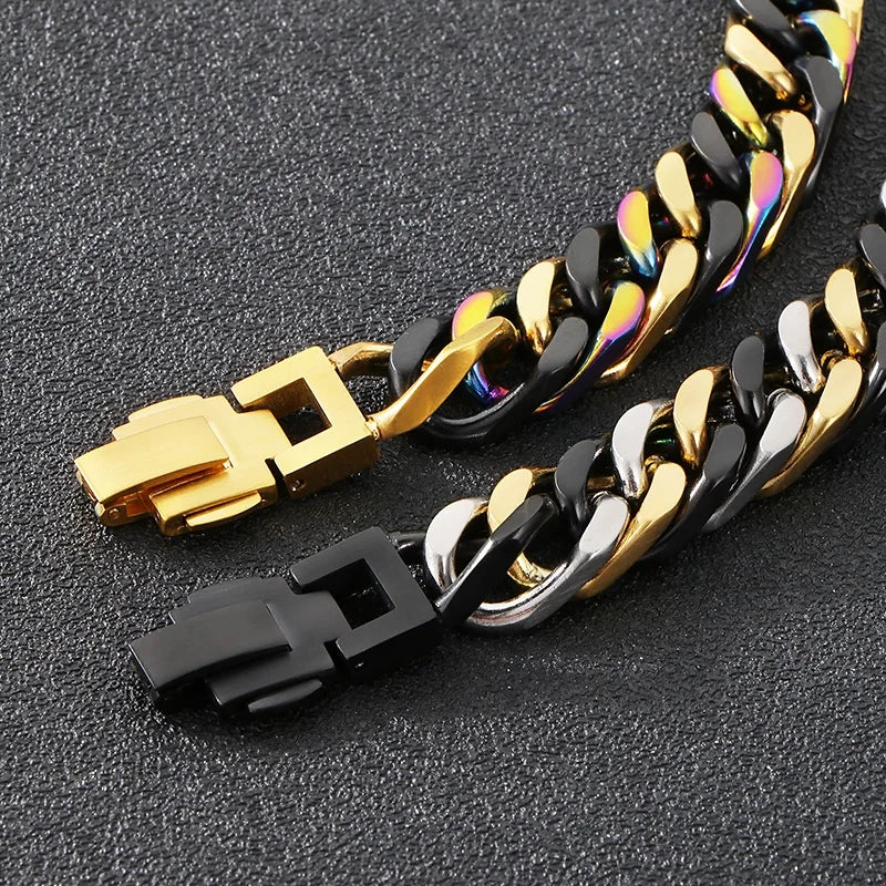 A close-up of a chunky Cuban link bracelet featuring gold and black metal links.