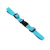 A bright blue adjustable tactical backpack chest strap harness.