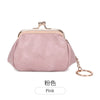 A pink leather coin purse with a gold-tone clasp and chain attached to the top.