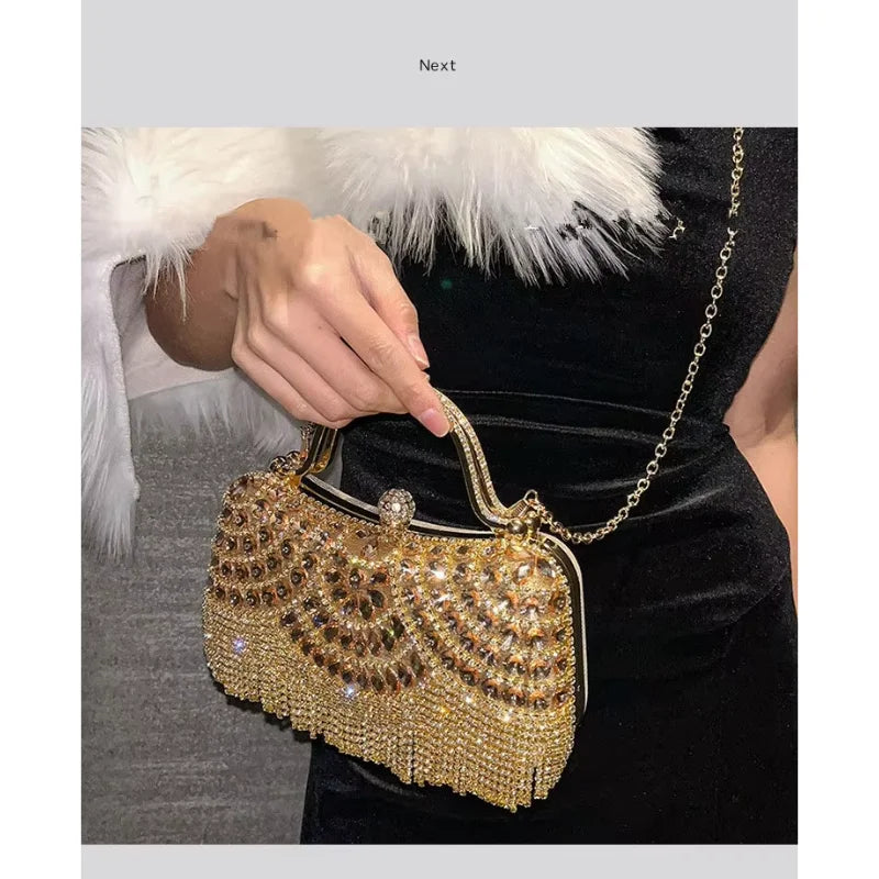 A close-up of an elegant diamond rhinestone evening clutch bag with a golden tassel being held against a black background.