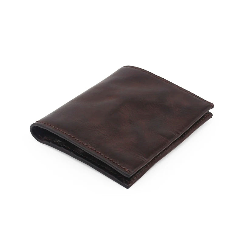 A dark brown genuine leather bifold wallet folded and displayed on a white background.