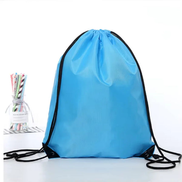Light blue drawstring backpack with black trim and multiple pockets