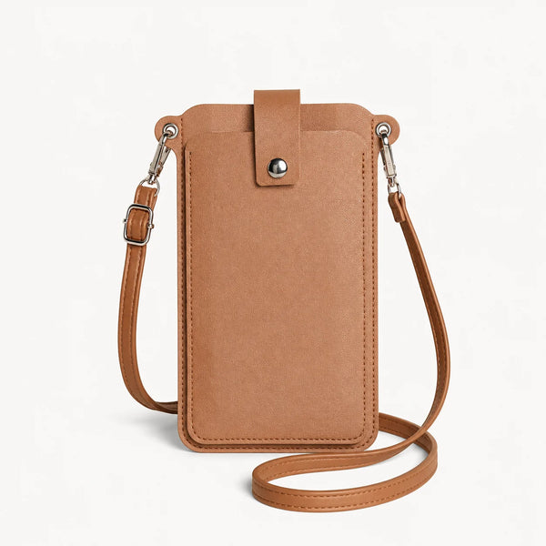 A tan mini PU leather crossbody phone bag with a leather strap and flap.