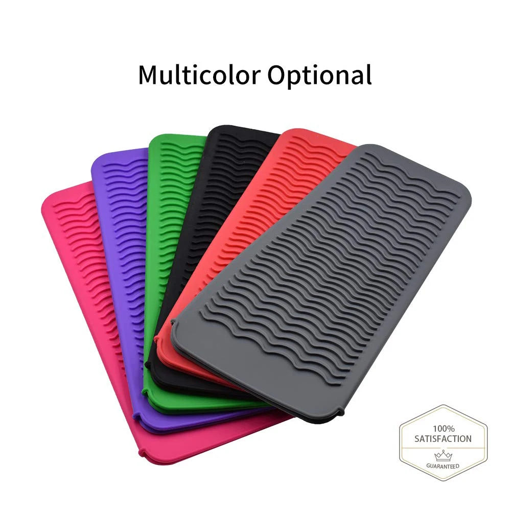 A set of multicolor heat-resistant silicone mats for styling tools, showing various colors like purple, green, black, and ora