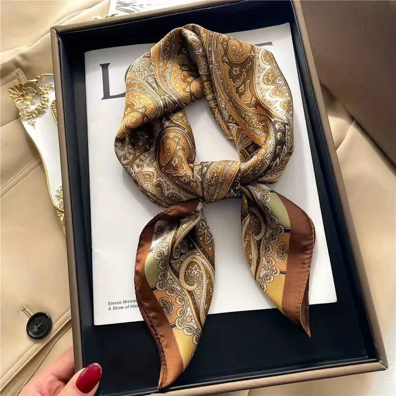Elegant paisley silk hair scarf and headband displayed in a black box.