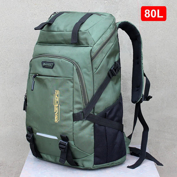 A dark green large capacity travel backpack with black accents and a black rain cover.