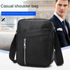 A black leather shoulder bag is shown next to a man in a suit, highlighting its large capacity and multi-layered storage feat