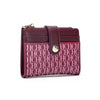 A maroon leather folding wallet with gold hardware and a textured pattern.