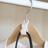 A multi-hook wardrobe organizer is shown hanging on a white rod, featuring a wooden hanger and a white hook.