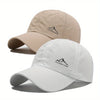A pair of beige and white outdoor baseball caps featuring a mountain logo embroidery.